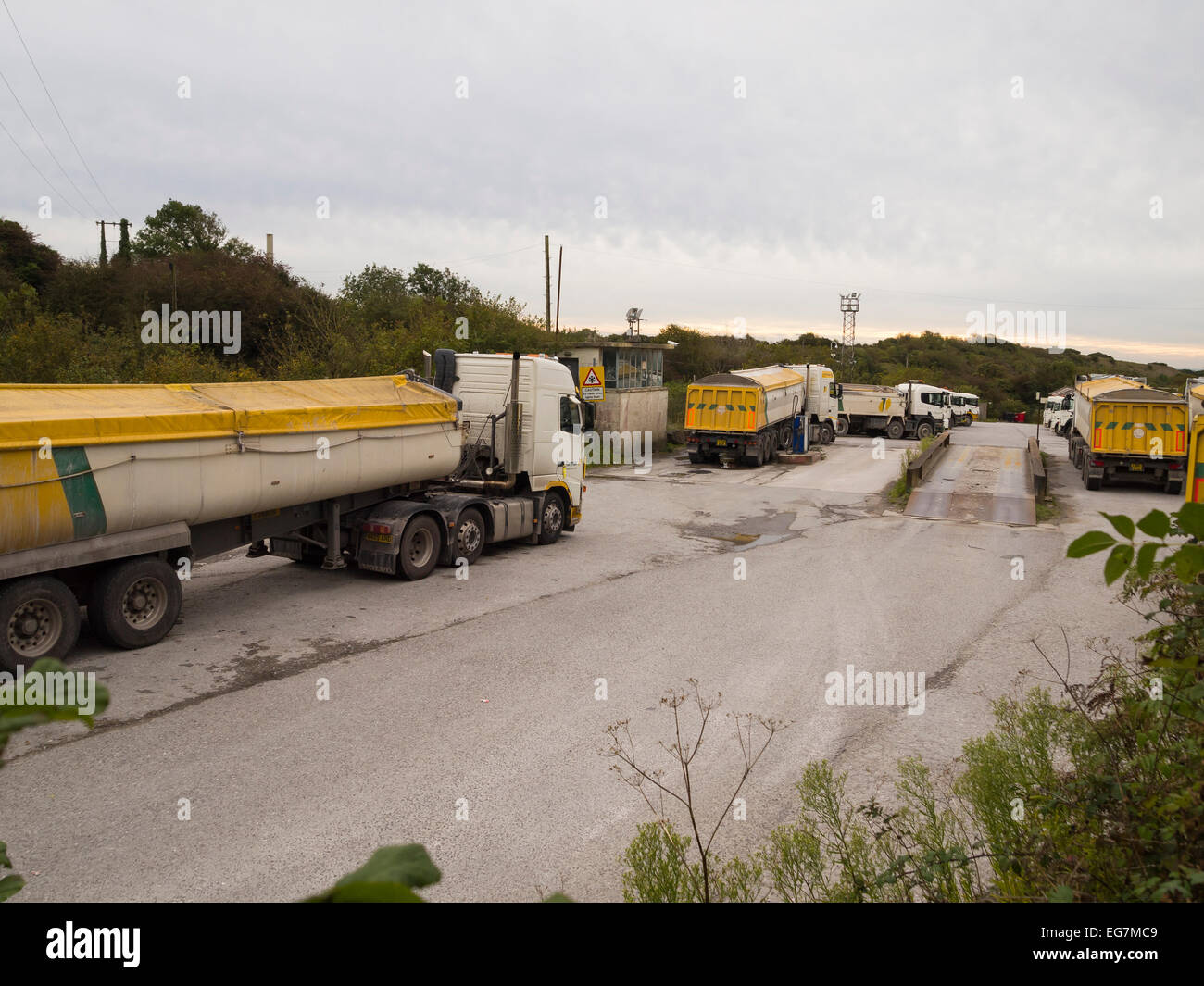 tipper trucks at quarry weighbridge Stock Photo