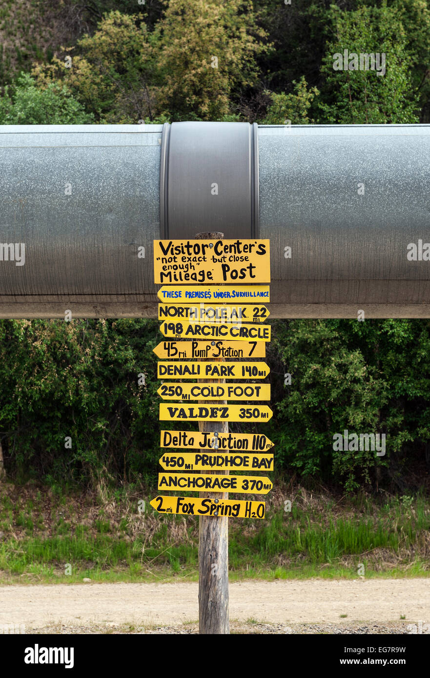 Trans Alaska oil pipeline with milage post sign. Stock Photo