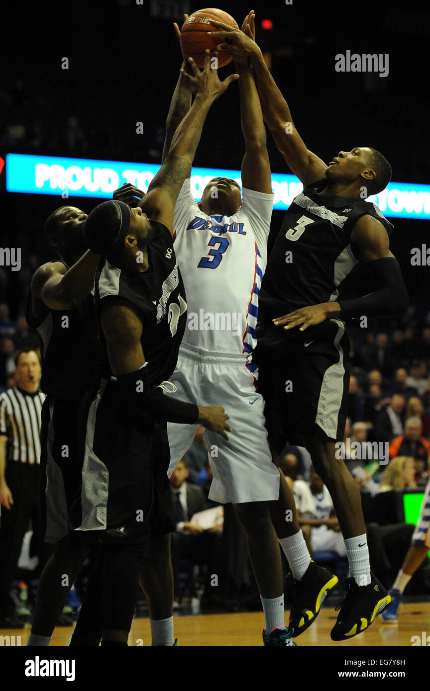 Rosemont, Illionois, USA. 18th February, 2015. DePaul Blue Demons forward Rashaun Stimage (3) takes a shot with Providence Friars guard Kris Dunn (3) blocks the shot during the NCAA men's basketball game between the Providence Friars and the DePaul Blue Demons at the Allstate Arena in Rosemont, IL. Providence won 80-53 over DePaul. Credit:  Cal Sport Media/Alamy Live News Stock Photo