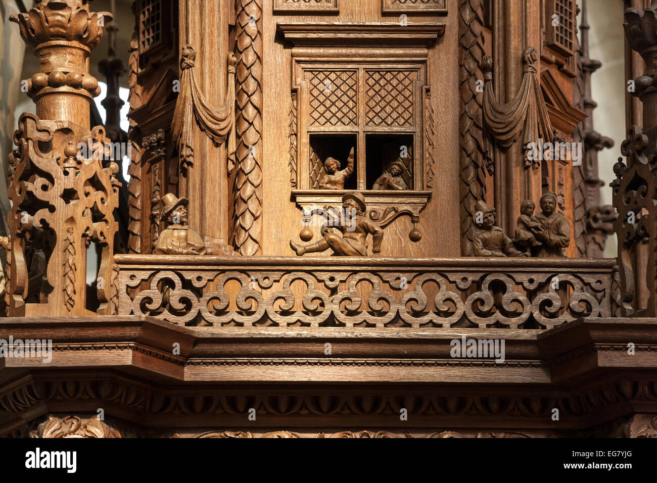 17th Century Woodcarvings on Pulpit with scenes of 17C daily life. Amsterdam De Nieuwe Kerk; The New Church interior. Stock Photo