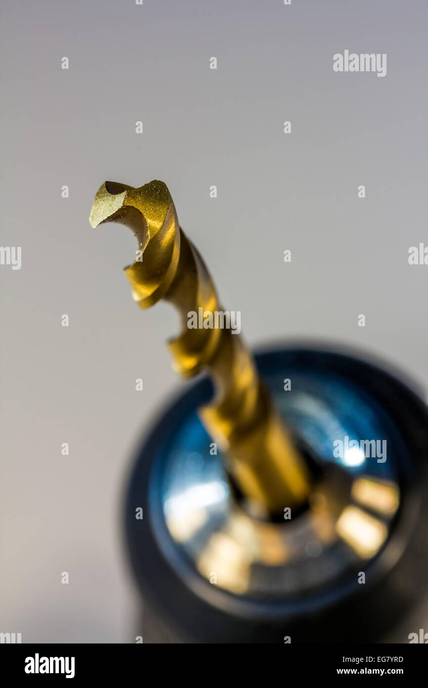 Handheld Drill closeup of drill bit, shallow Depth of Field (DOF) Stock Photo
