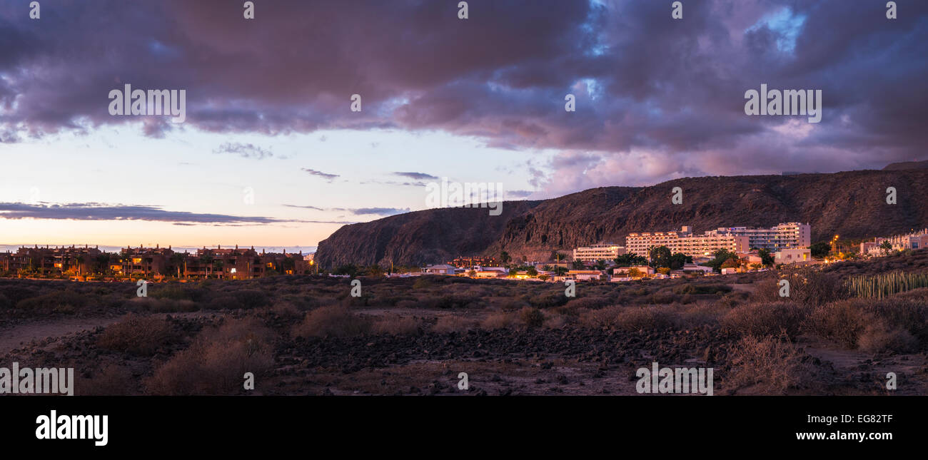 The holiday resort of Palm Mar at dusk from Malpais de la Rasca, Tenerife, Canary Islands Stock Photo