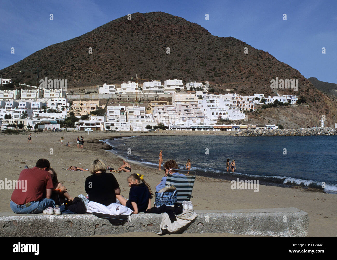 family on the beach, San Jose, Cabo de Gata - Nijar Natural Park, Andalucia, Spain Stock Photo