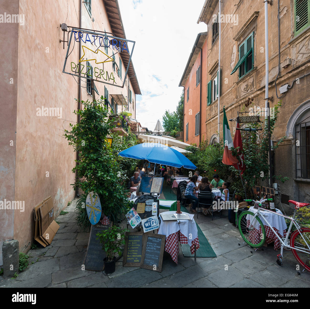 Street scene with restaurants, Pisa, Tuscany, Italy Stock Photo