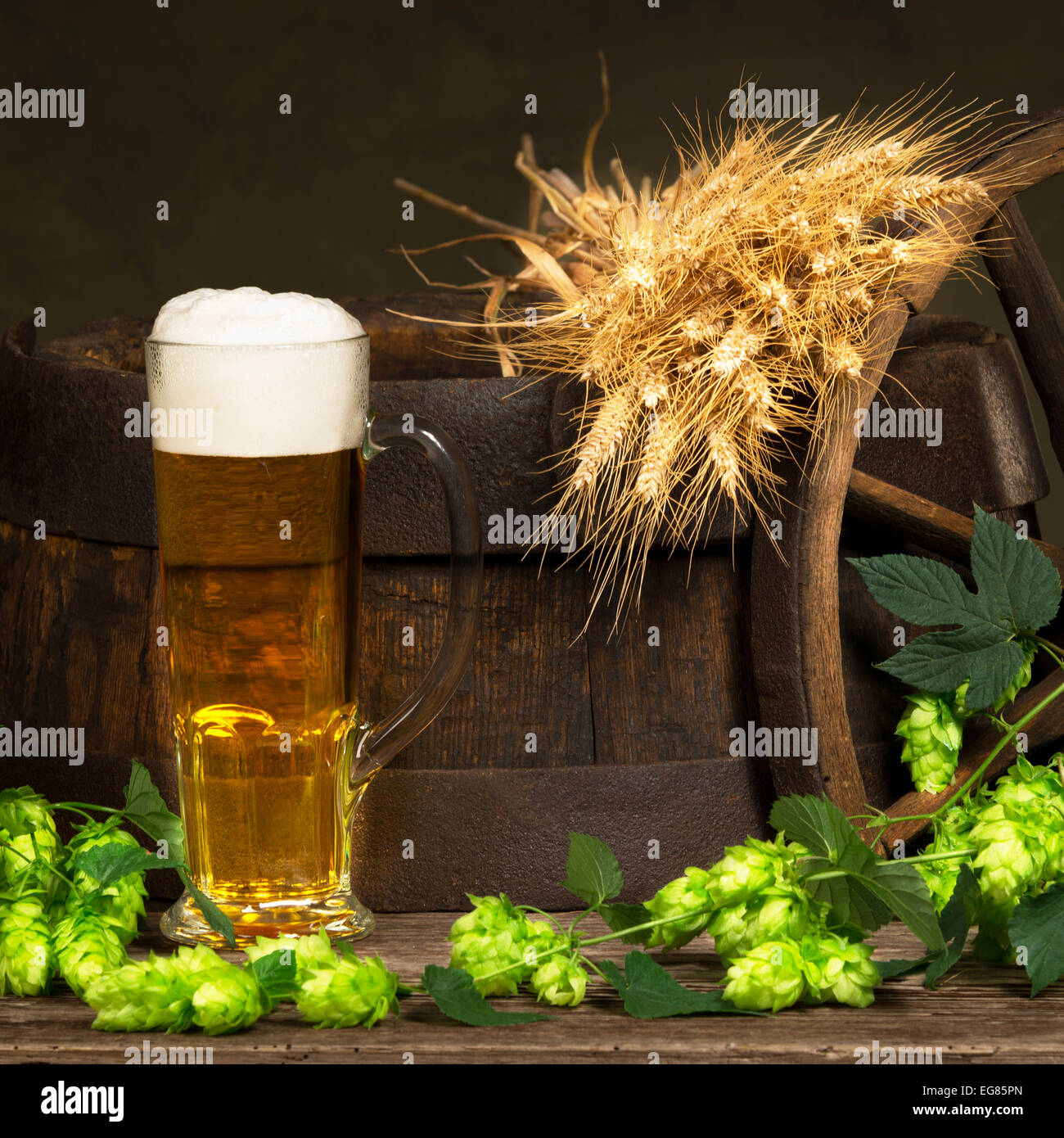 glass of beer with raw material for beer production Stock Photo Alamy