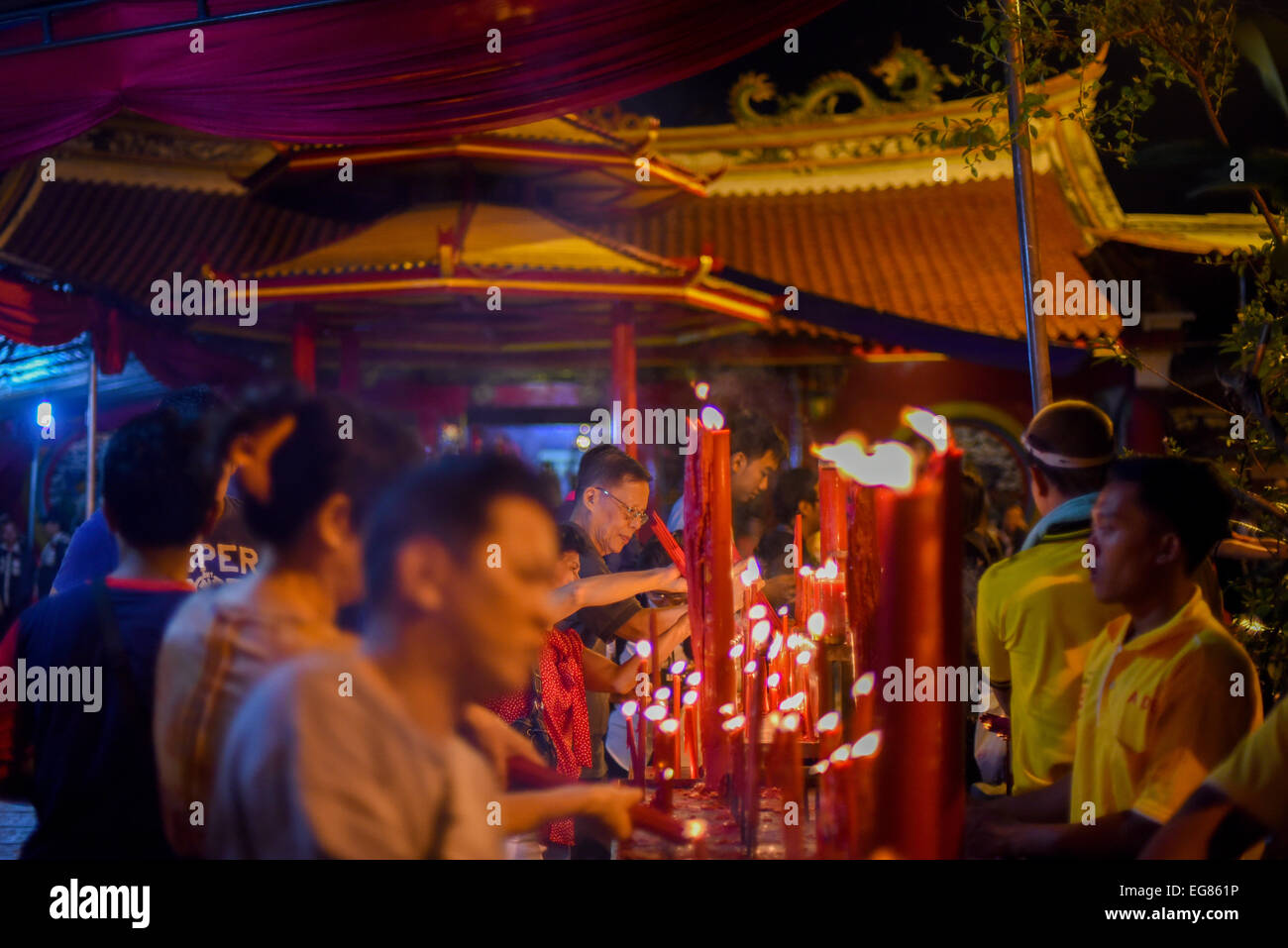 People burn incense sticks called Hio, hoping for prosperity and