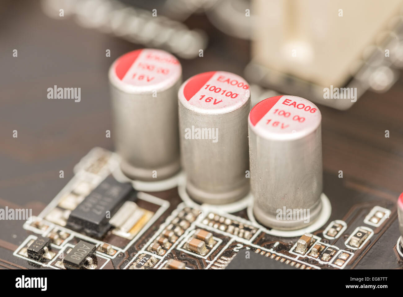 Computer Chip Capacitors And Resistors On Motherboard Stock Photo