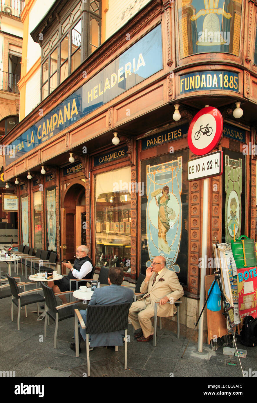 Spain, Andalusia, Seville, La Campana, pastry shop, people Stock Photo
