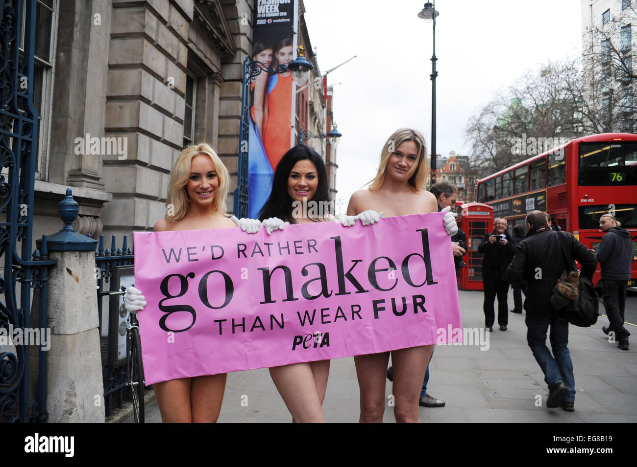 woman marches during go naked London, UK. 19th February, 2015. PETA staged a naked protest with banner  against the fur trade at Somerset House, the Strand, at the beginning of  London Fashion Week. Models ltr Katy Heffernan