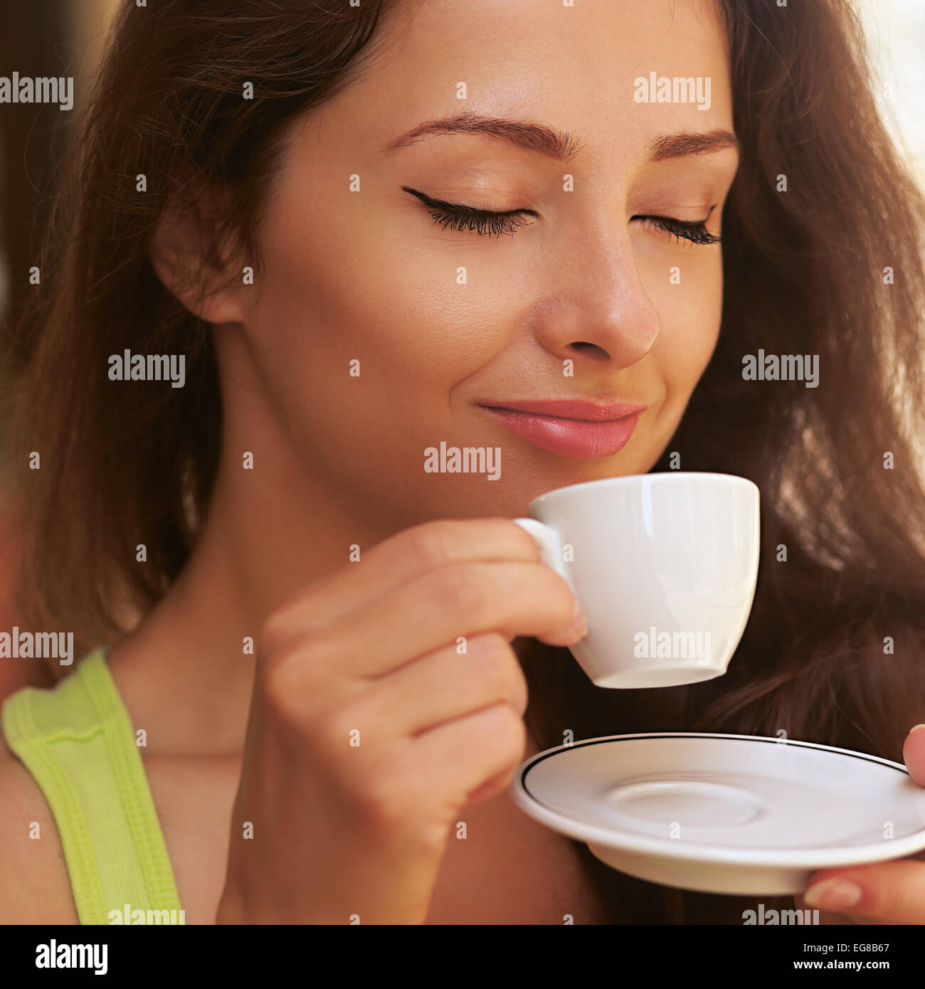 Beautiful Enjoying Woman Drinking Coffee From Cup Outdoors With Closed