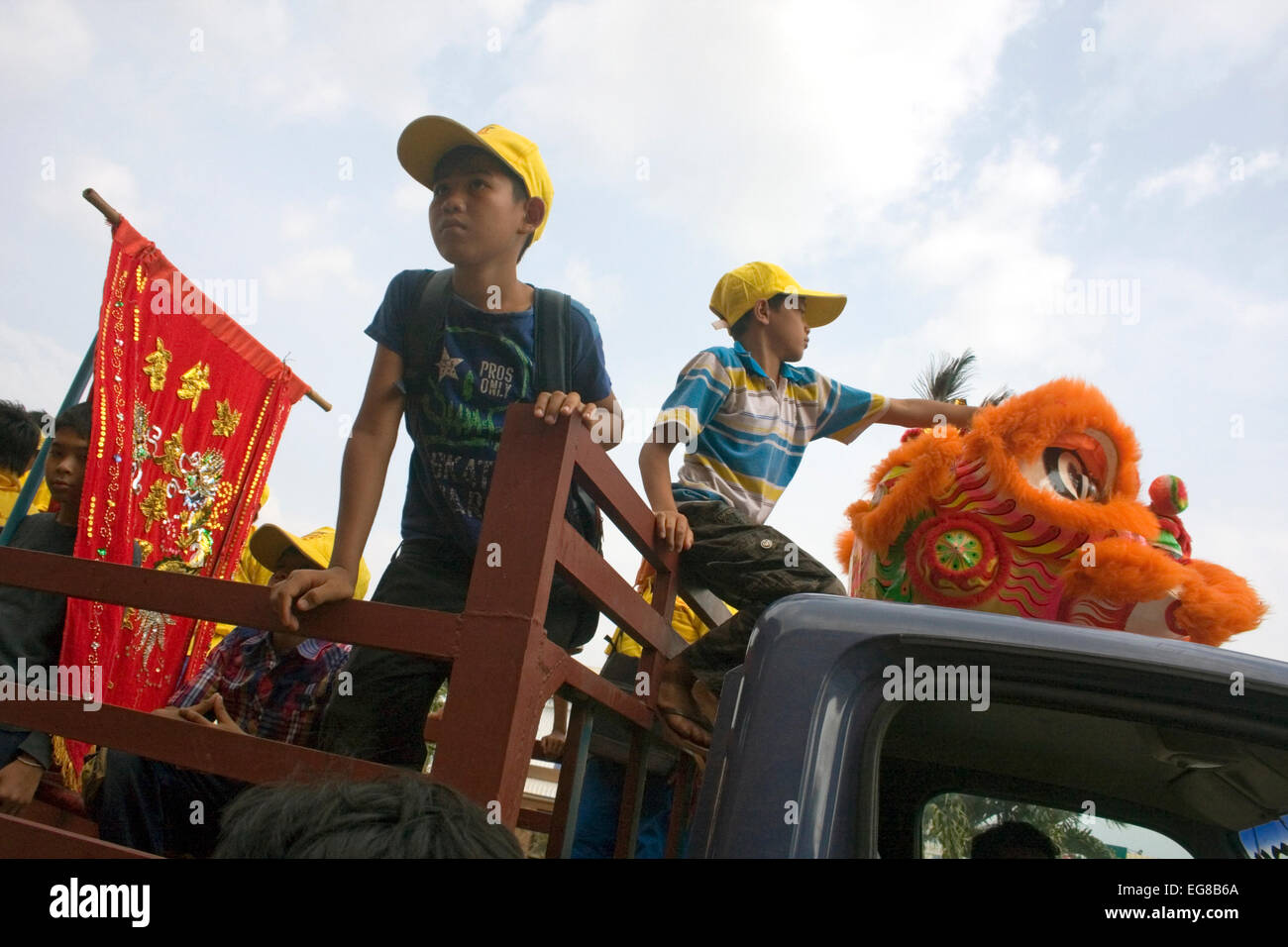 A group of young people are in a truck preparing to perform a show on Chinese New Year in Kampong Cham, Cambodia. Stock Photo
