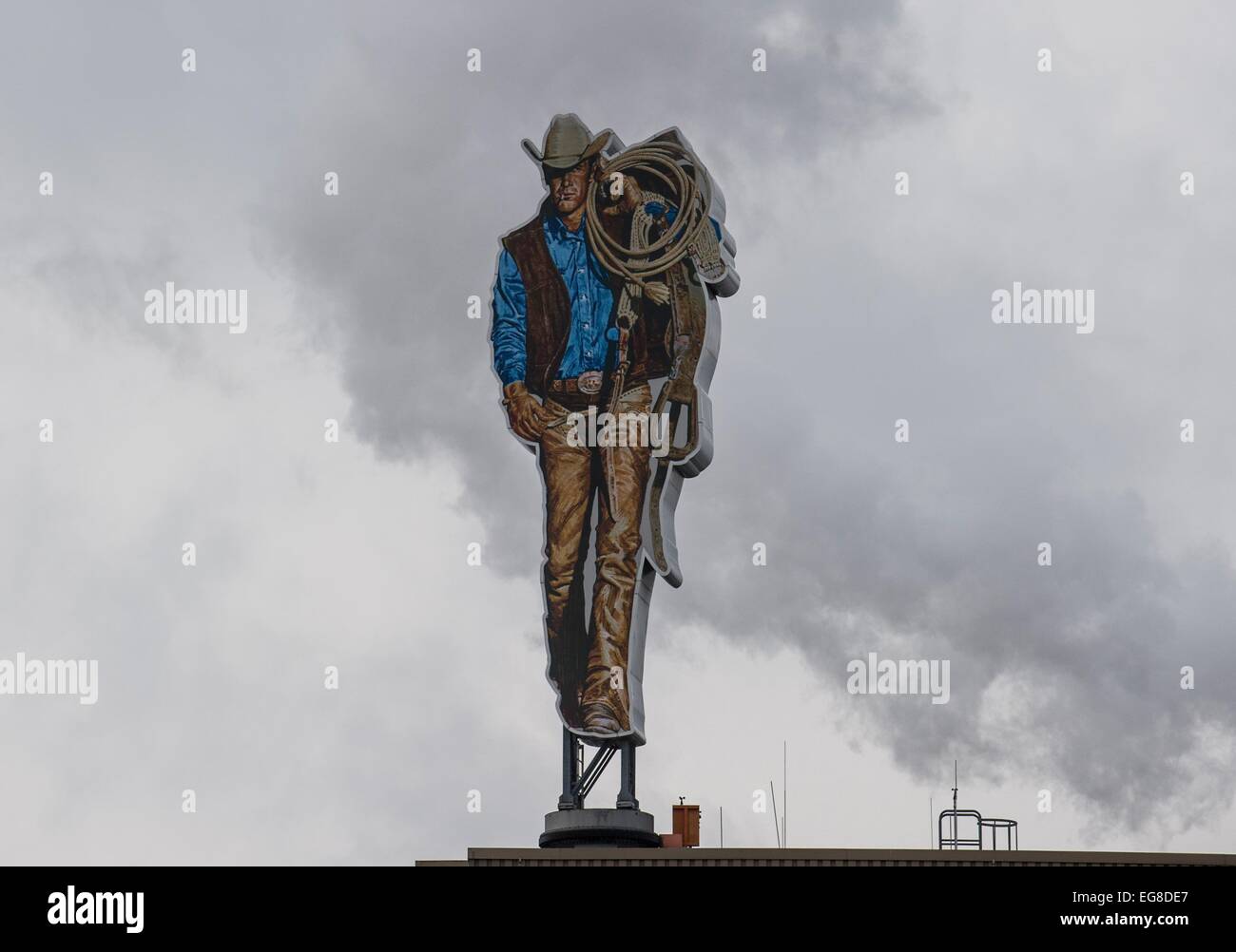 The advertising character of Marlboro man is on display  on the premises of cigarette manufacturer Philip Morris in Berlin, Germany, 3 February 2014. Photo: Paul Zinken/dpa Stock Photo