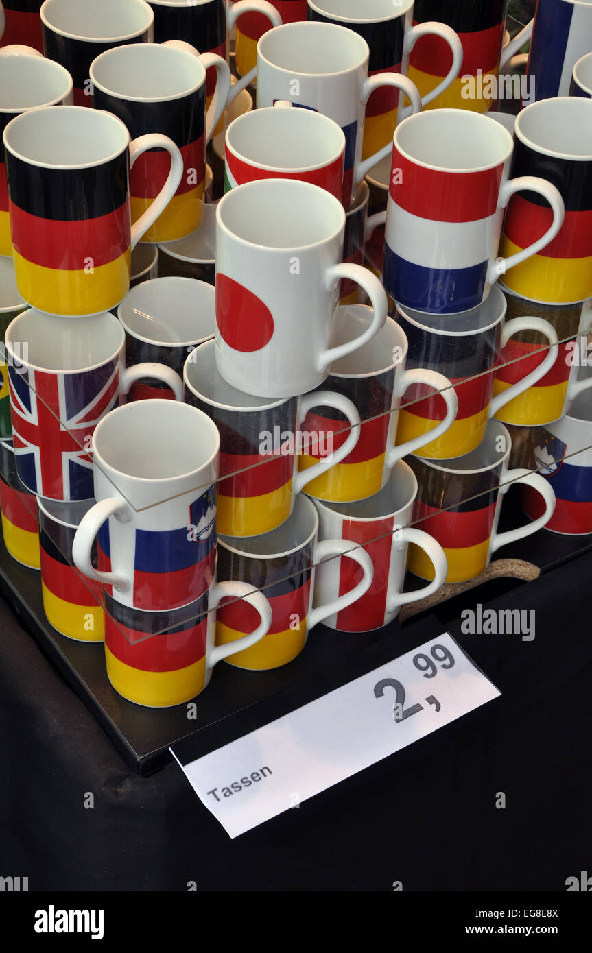 Stacked Cups printed with national flags in a souvenir shop Stock Photo