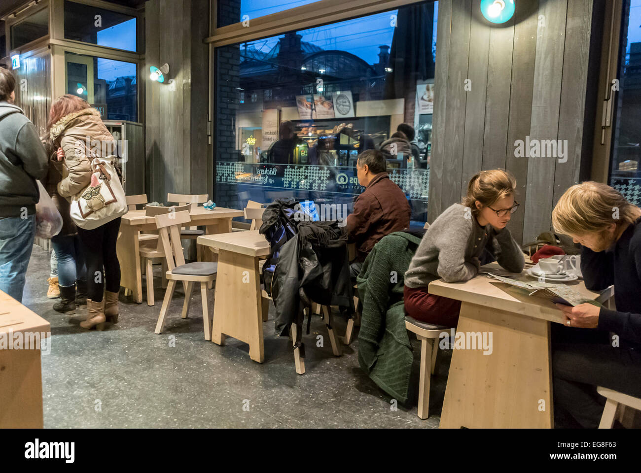 Berlin, Germany, group drinking coffee bar, People at Tables, Sharing