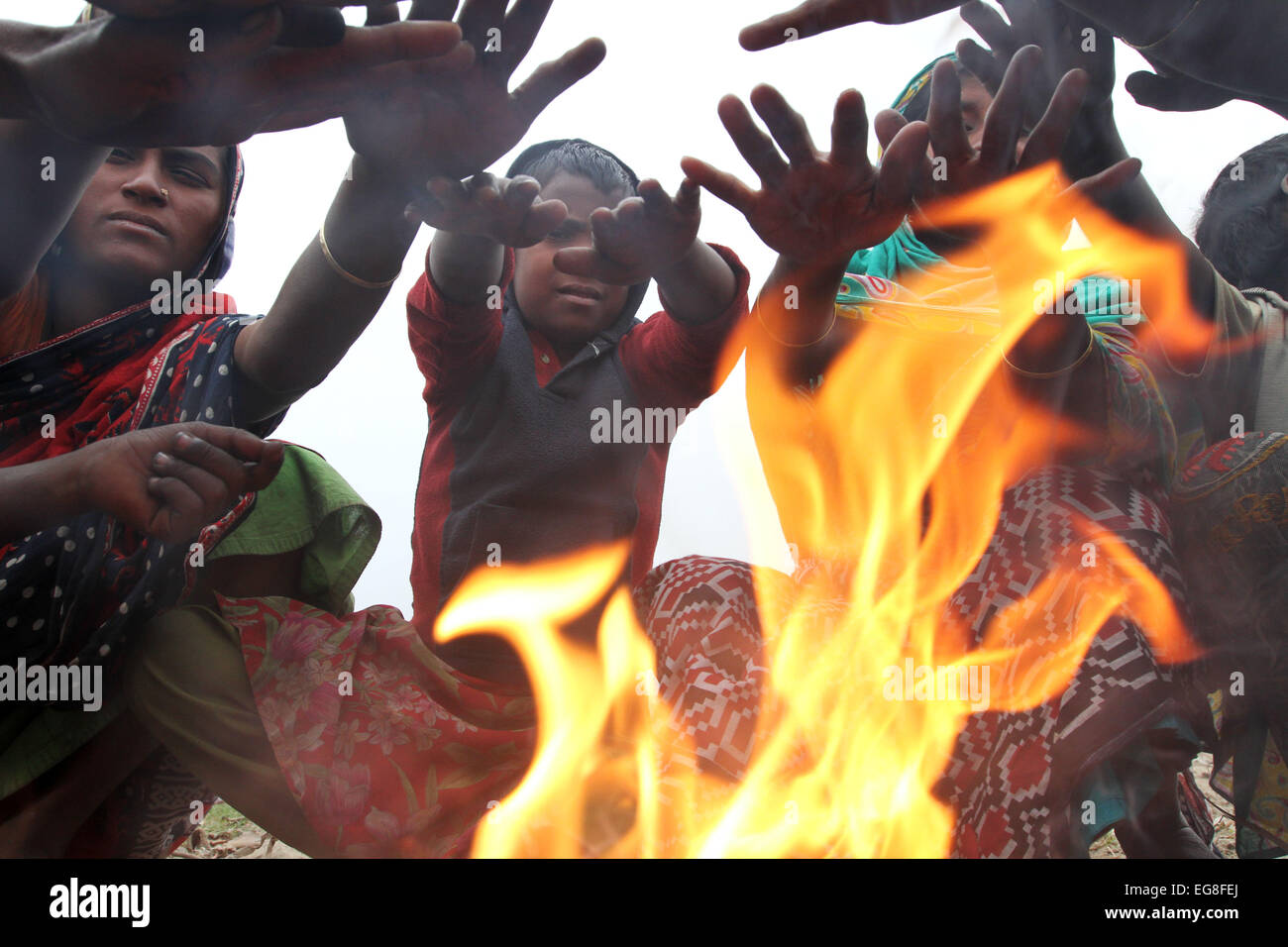 Homeless children create fire by using discarded wood or plastic to ...