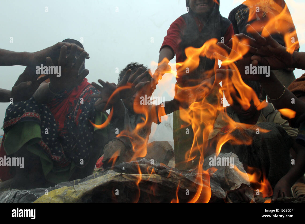Homeless children create fire by using discarded wood or plastic to ...