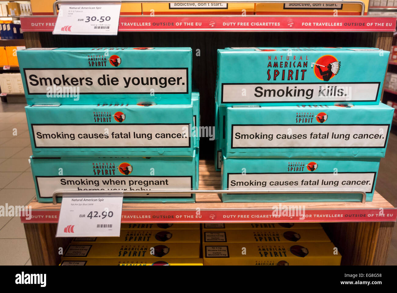Berlin, Germany,  Shopping inside Duty Free shops at Schonefeld SXF Airport, Detail Tobacco Packages with Dangerous Product Warning Labels Stock Photo
