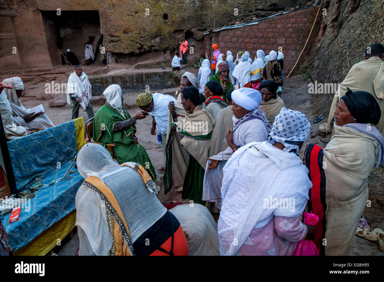 Pilgrims Are Blessed By A Priest At Bete Maryam Church, Lalibela, Ethiopia Stock Photo