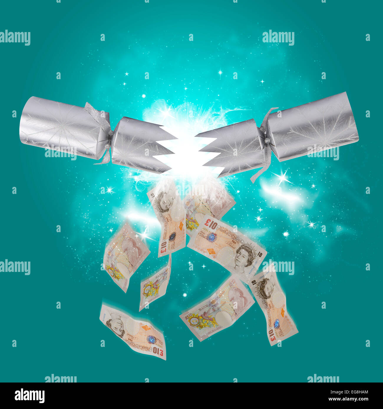 concept image of money falling from a Christmas cracker Stock Photo Alamy