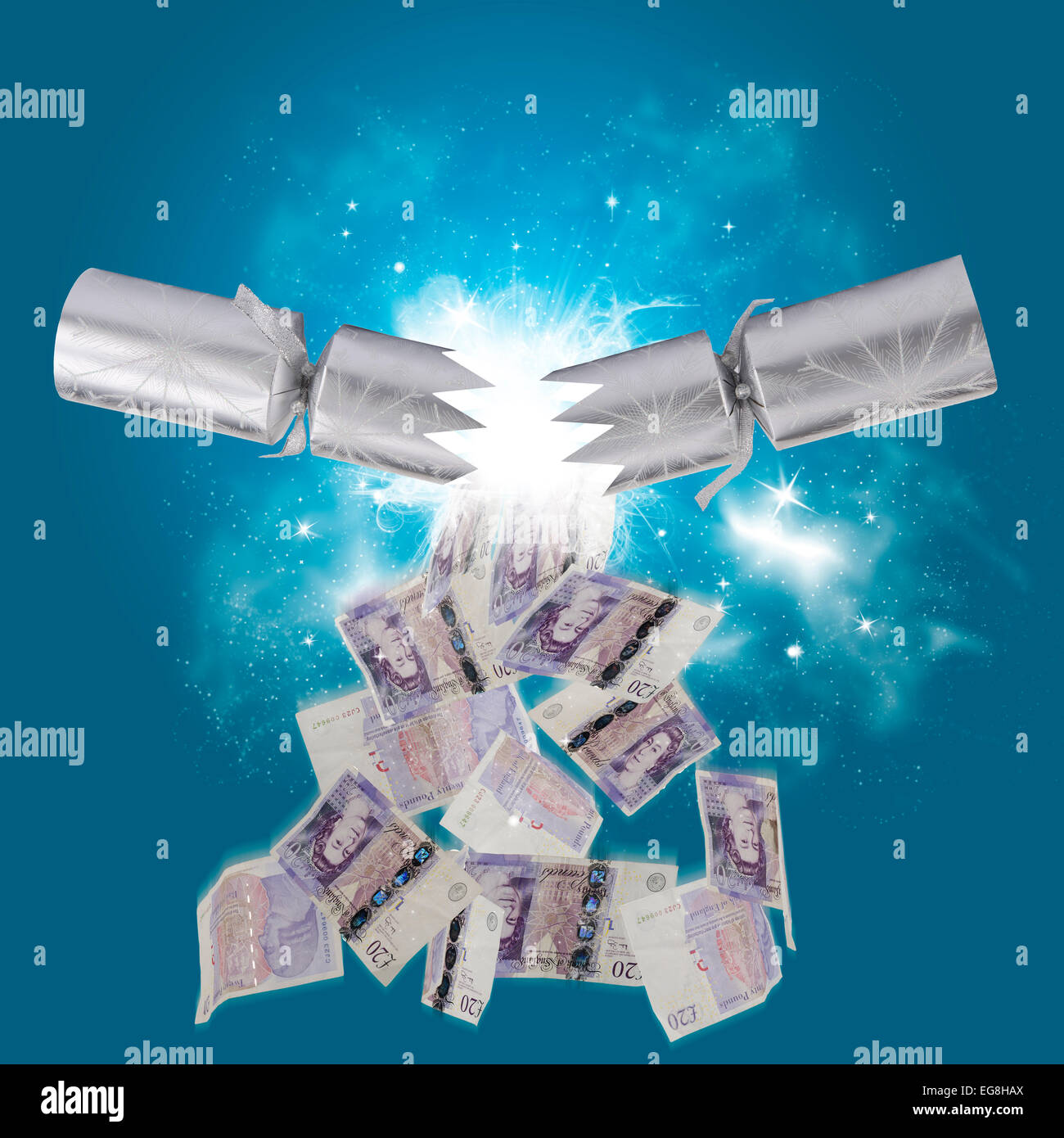 concept image of money falling from a Christmas cracker Stock Photo