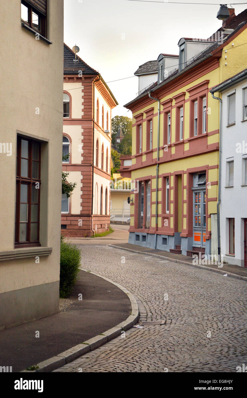 Street with Cobblestone pavement and houses in Lahr a city in Baden-Wurttemberg, Germany Stock Photo