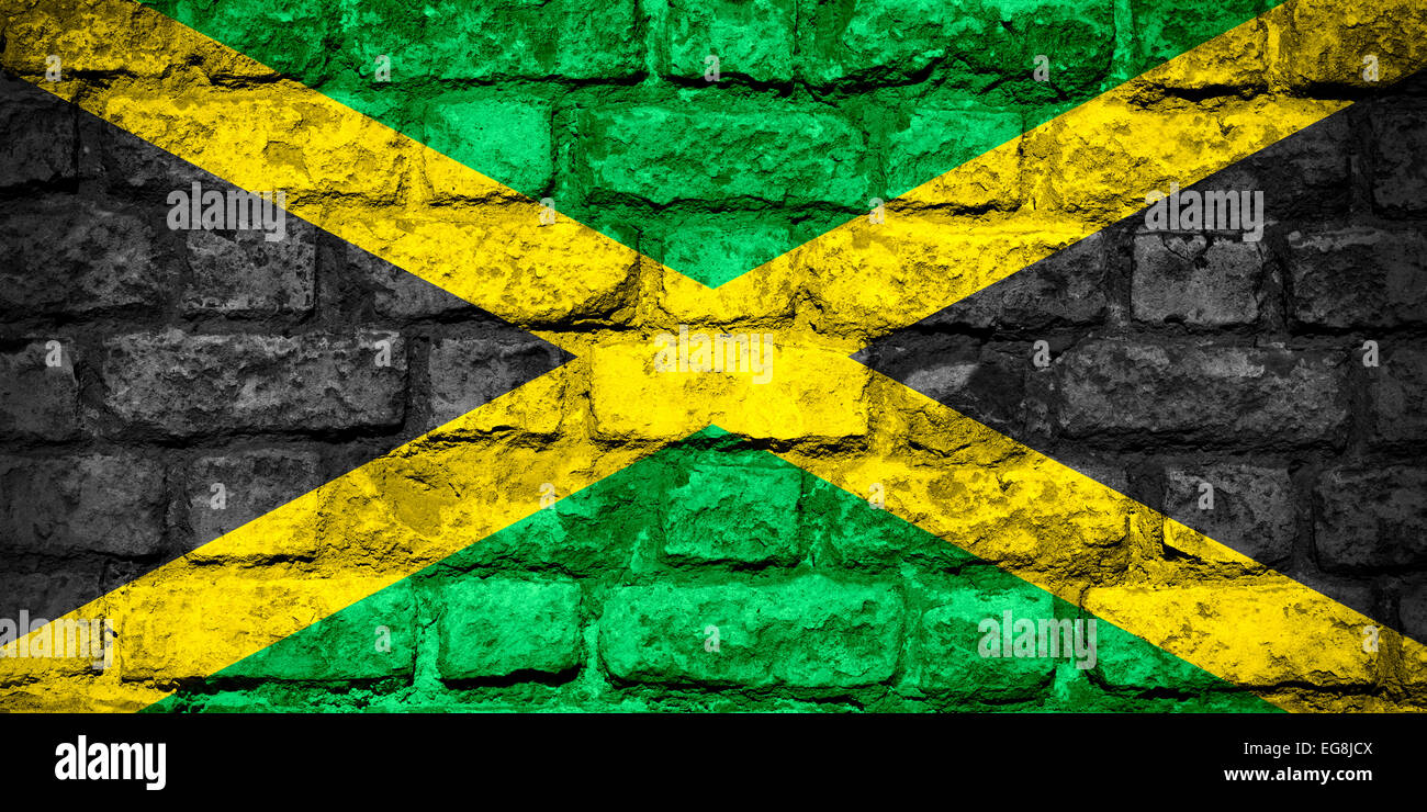 flag of Jamaica or Jamaican banner on brick texture Stock Photo
