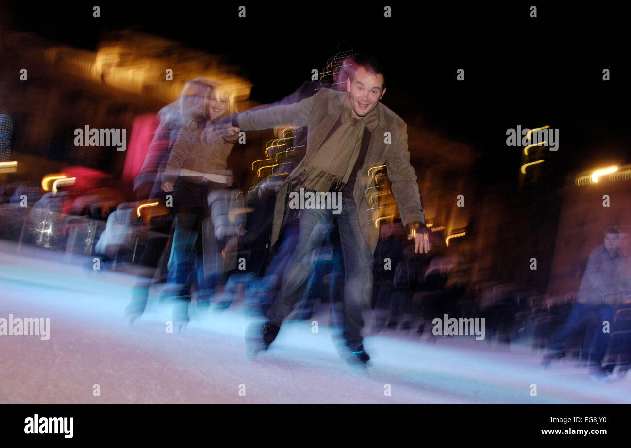 couples skate at Somerset House winter xmas period london UK Stock Photo