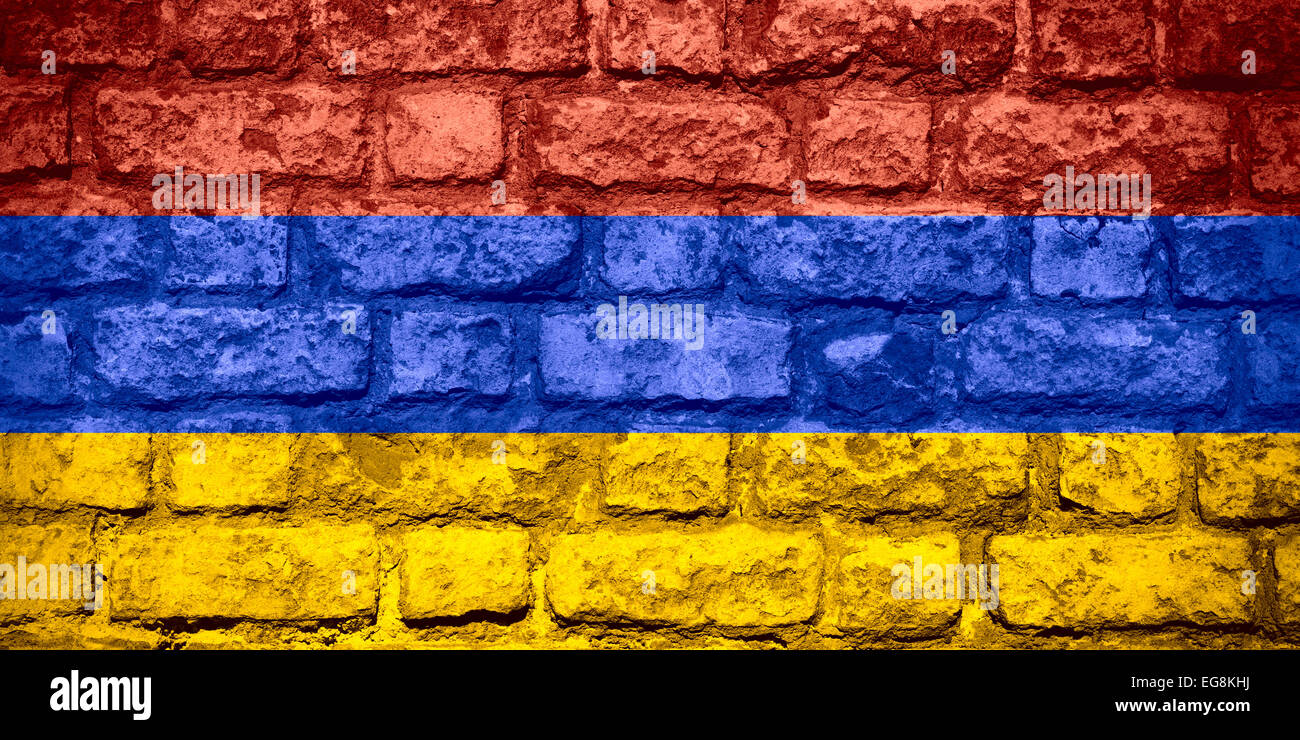 flag of Armenia or Armenian banner on brick texture Stock Photo