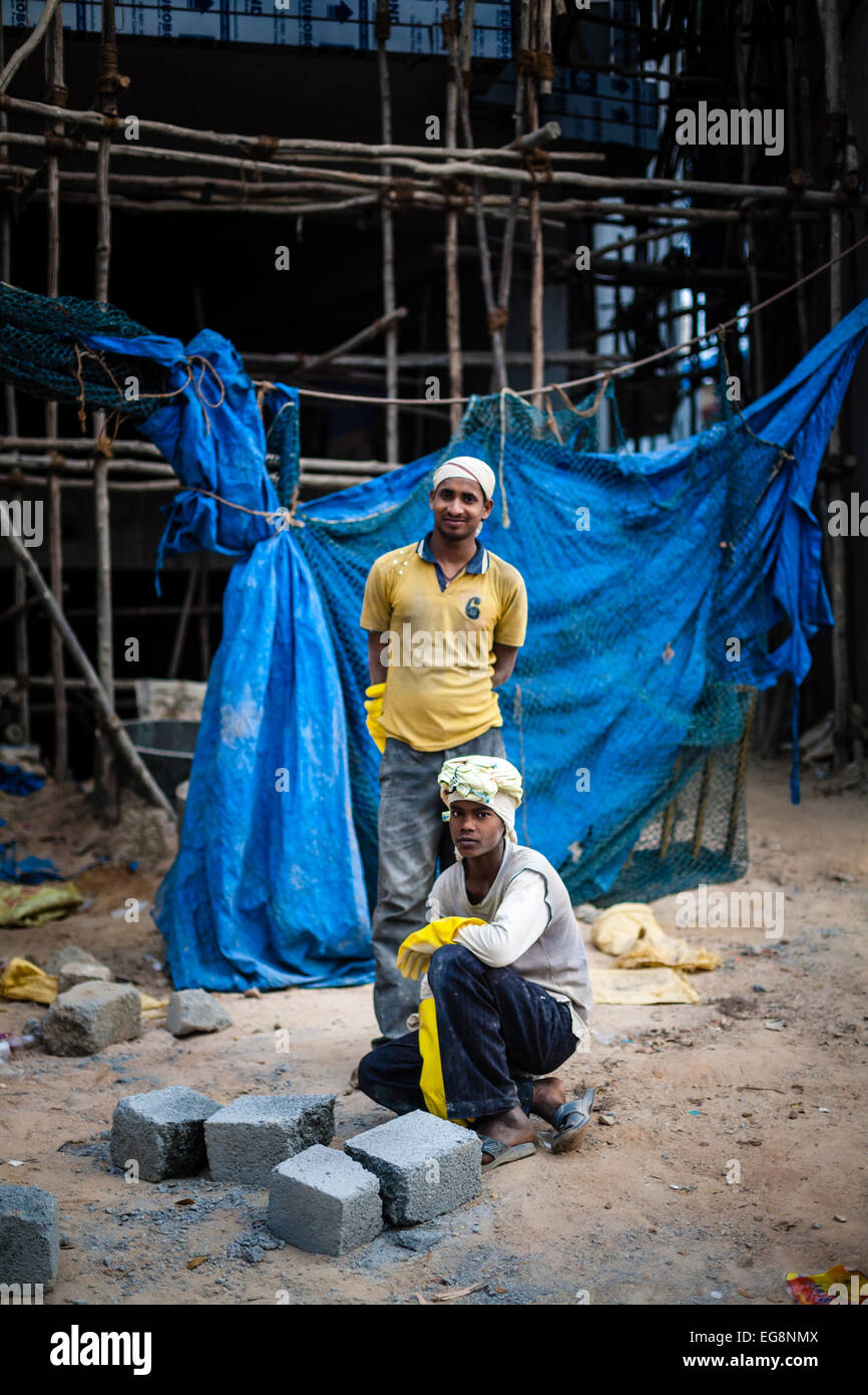 Indian construction workers on an Indian construction sight. Stock Photo