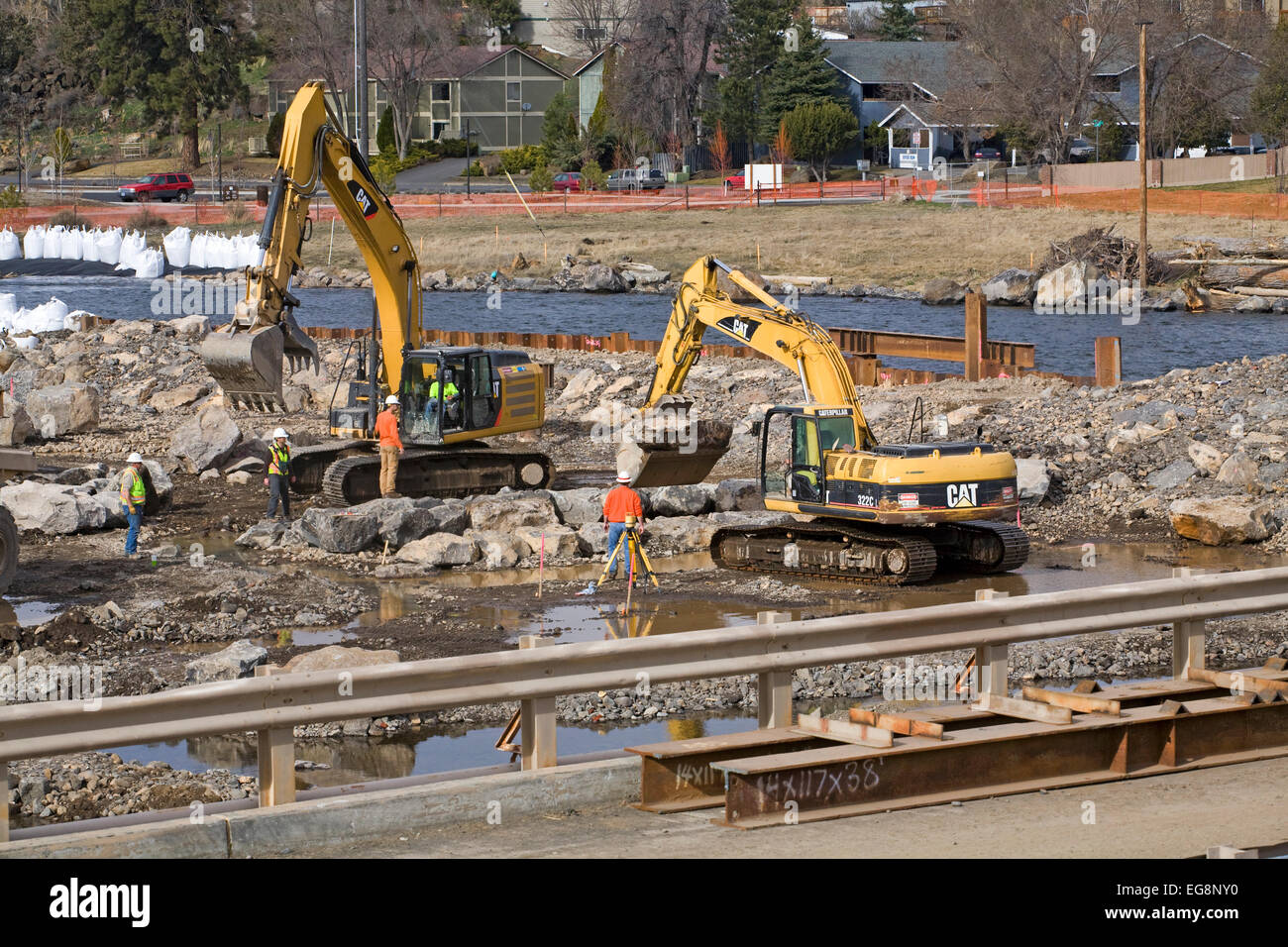 Heavy earthmoving shovels and other equipment working on changing the