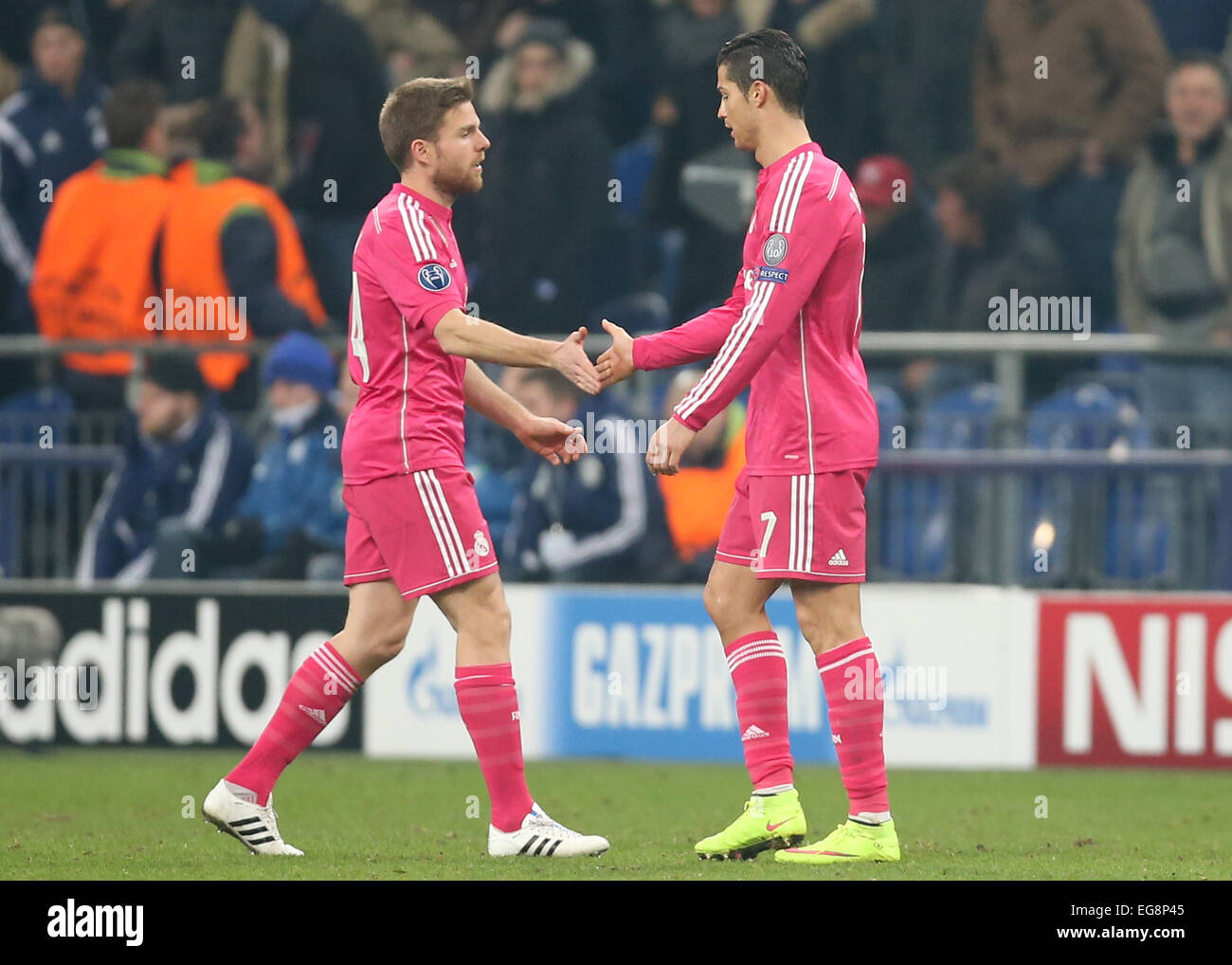 Gelsenkirchen, Germany. 18th Feb, 2015. Madrid's Cristiano Ronaldo (r) and Javier Hernandez (l) during the Champions League Round of 16 match FC Schalke 04 vs Real Madrid in Gelsenkirchen, Germany, 18 February 2015. Photo: Friso Gentsch/dpa/Alamy Live News Stock Photo