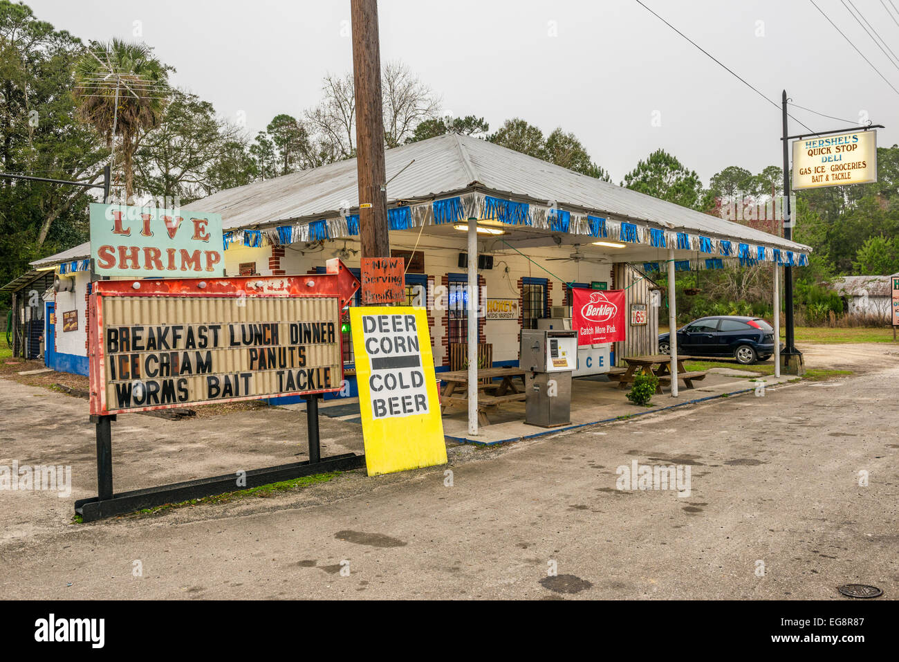 Vintage gas pump and a general store on US Highway 19, near Cedar Key, Florida Stock Photo