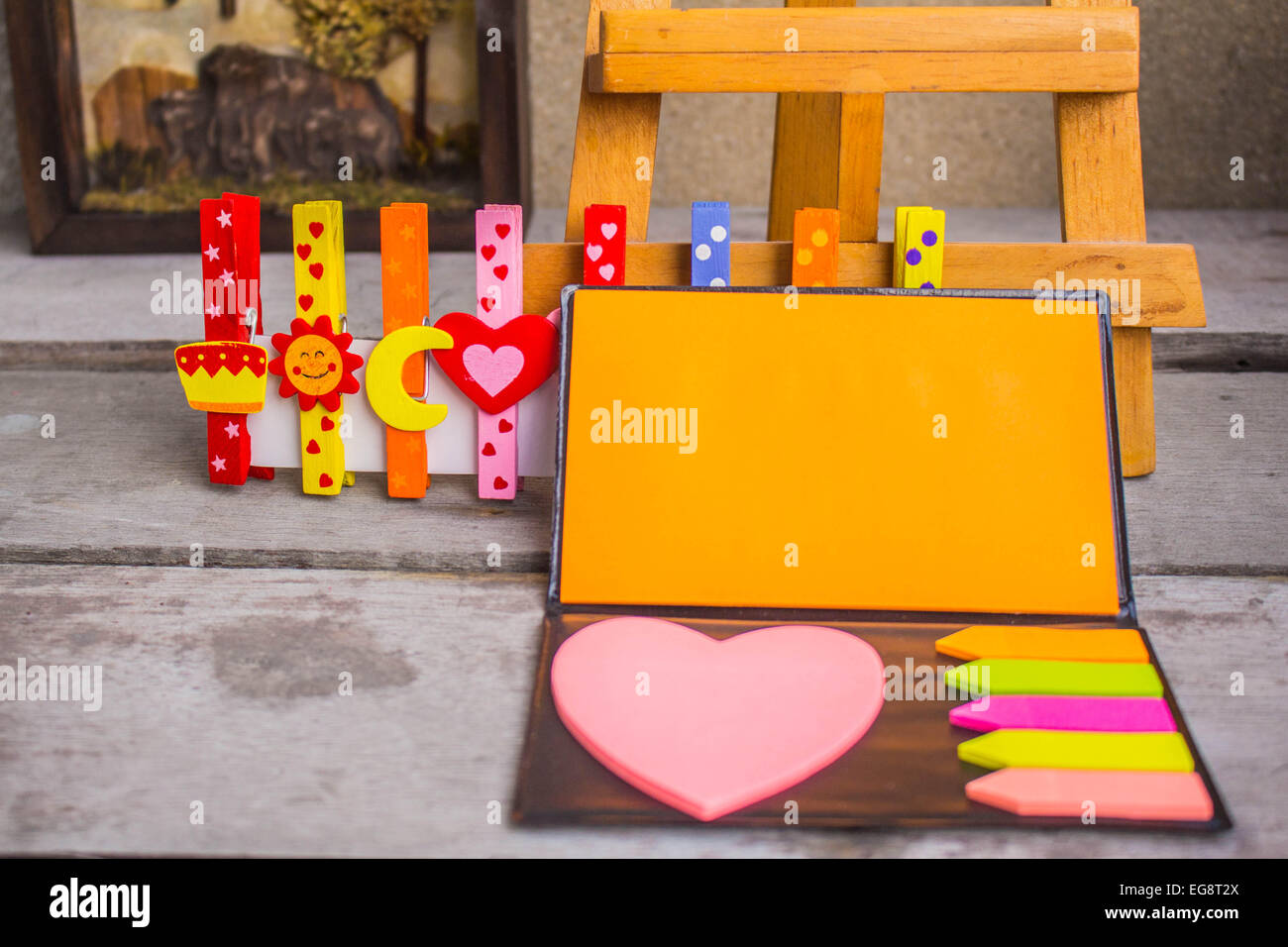 Note Peg Project Notepad and the colorful peg Stock Photo - Alamy