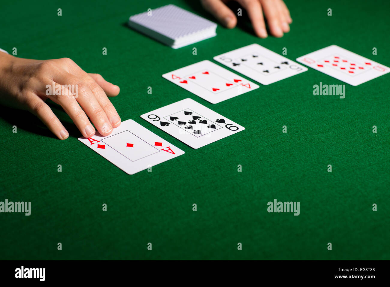 holdem dealer with playing cards Stock Photo