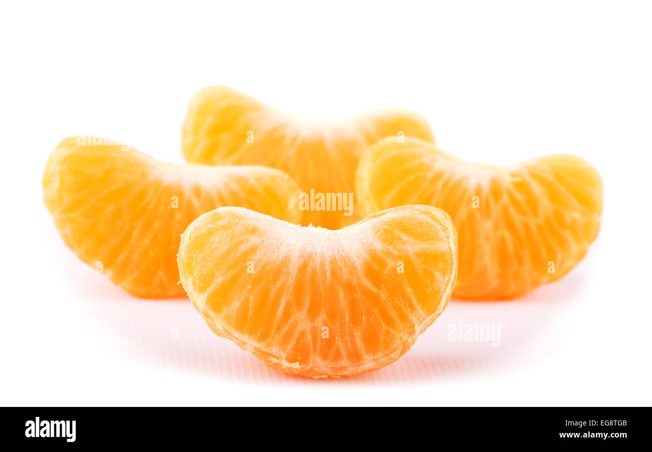 Slice of Clementine with more slices on background, on white Stock Photo