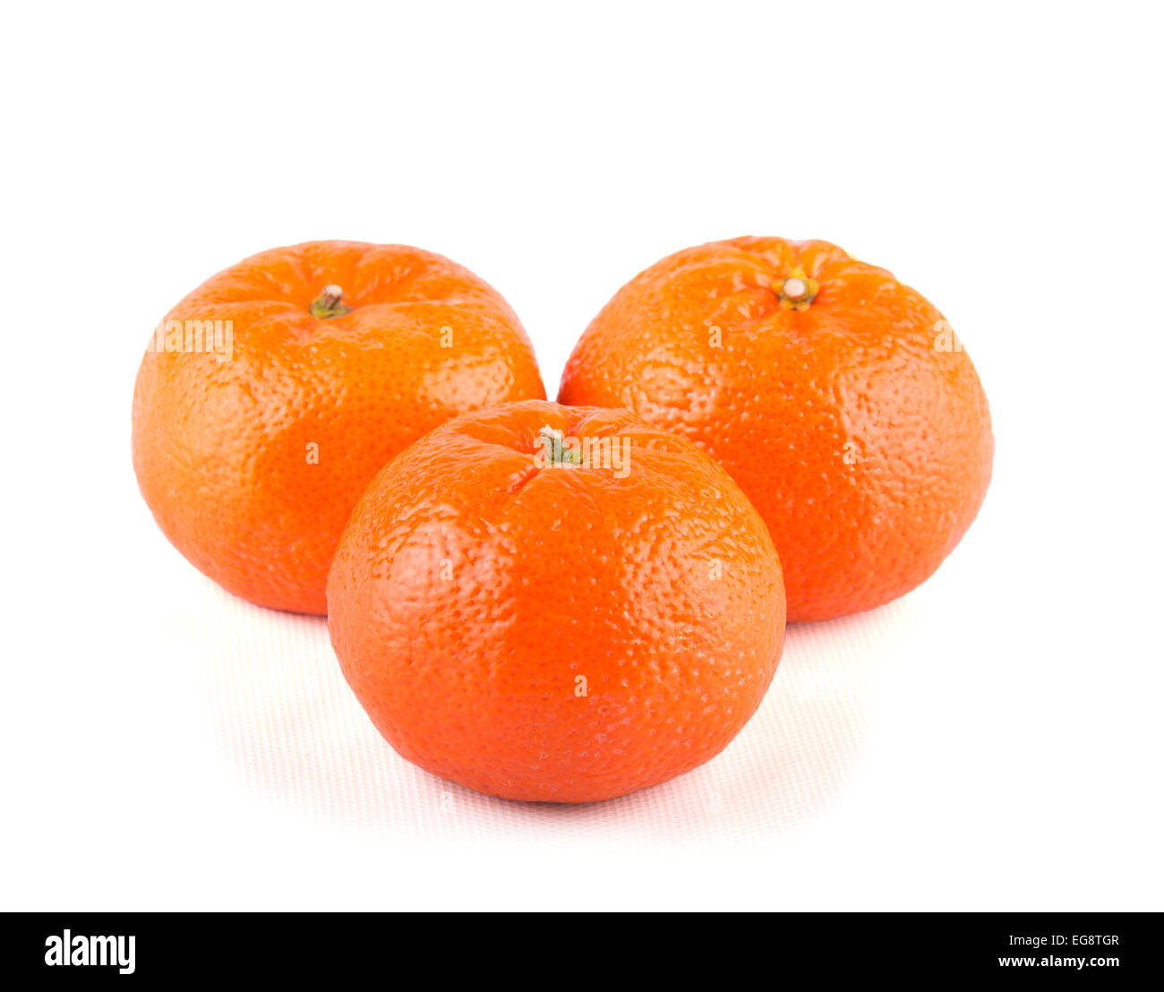 Three Clementines on white Stock Photo