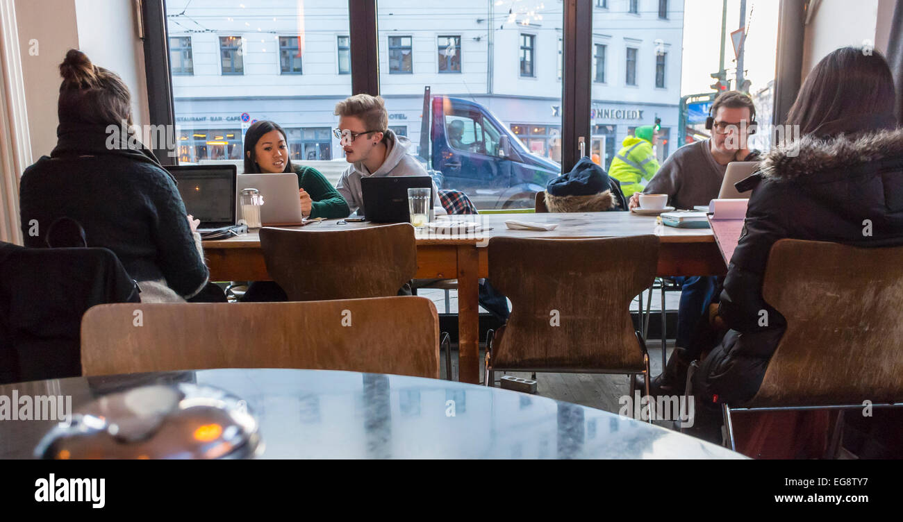 Berlin, Germany, group drinking busy coffee bar, Young People Sharing
