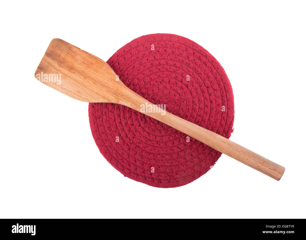 Wooden spatula on dark red knit pot holder, isolated on white Stock Photo