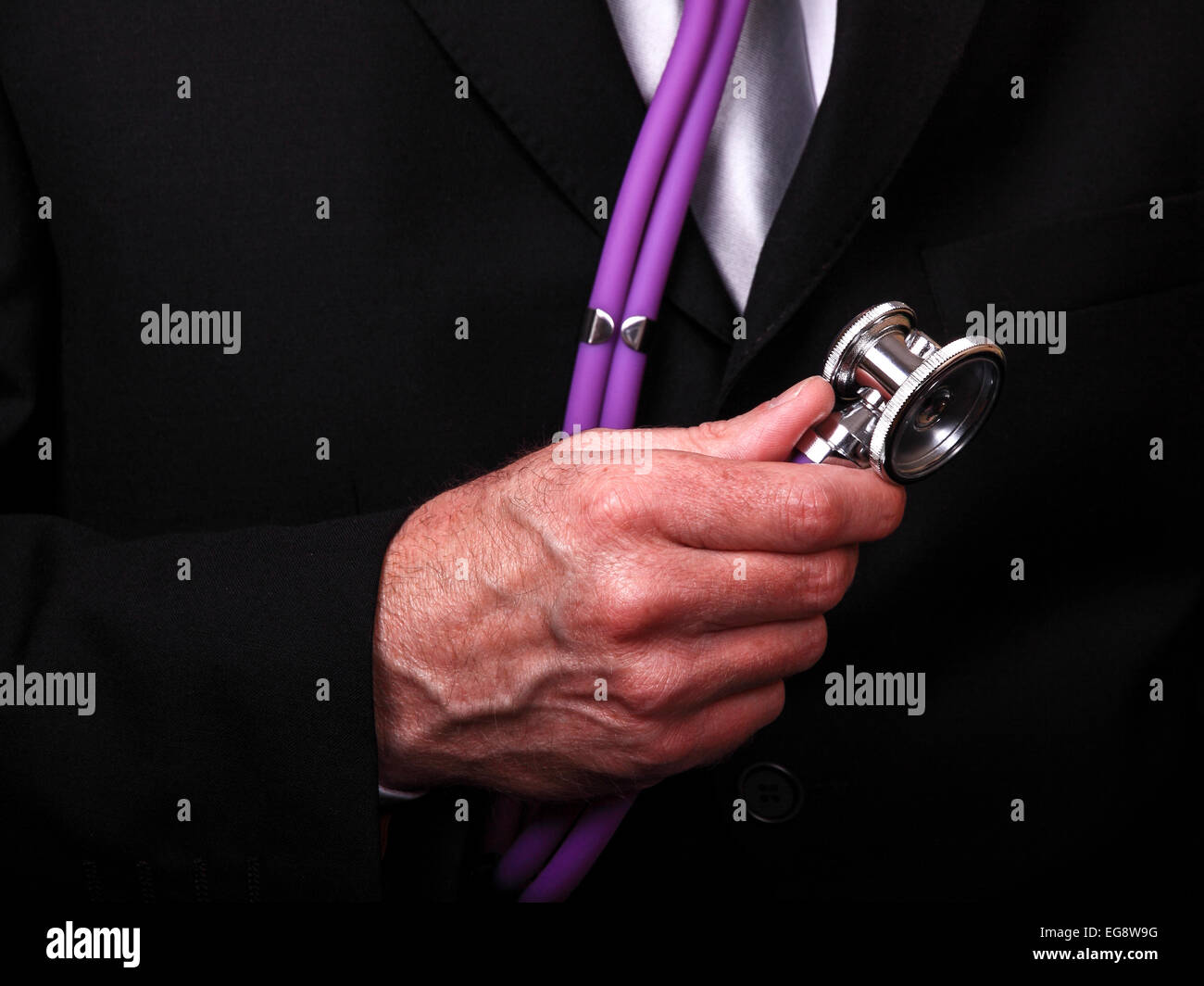 Man holding stethoscope Stock Photo