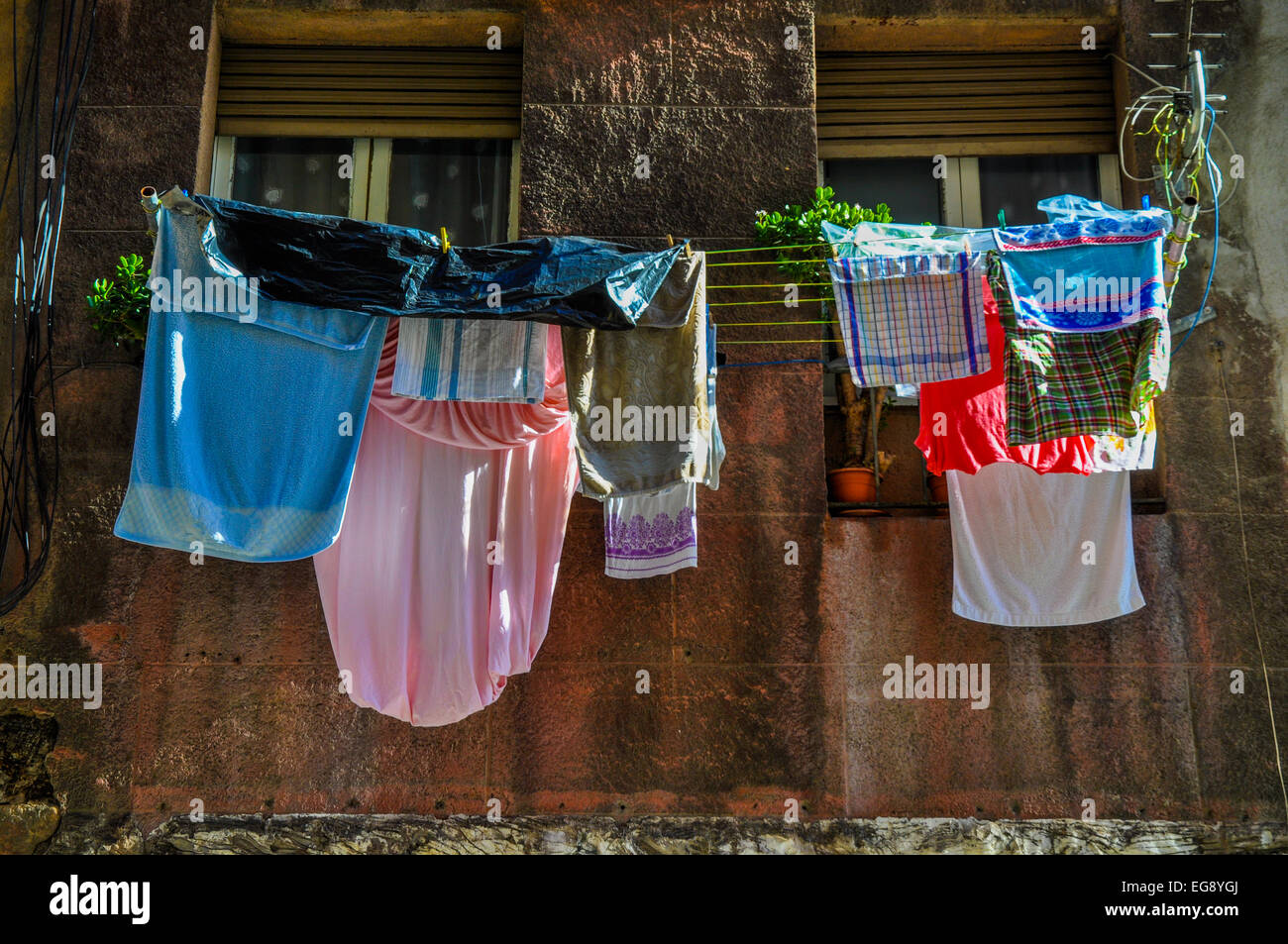 clothes laundry hanging out to dry in Barcelona Spain Stock Photo