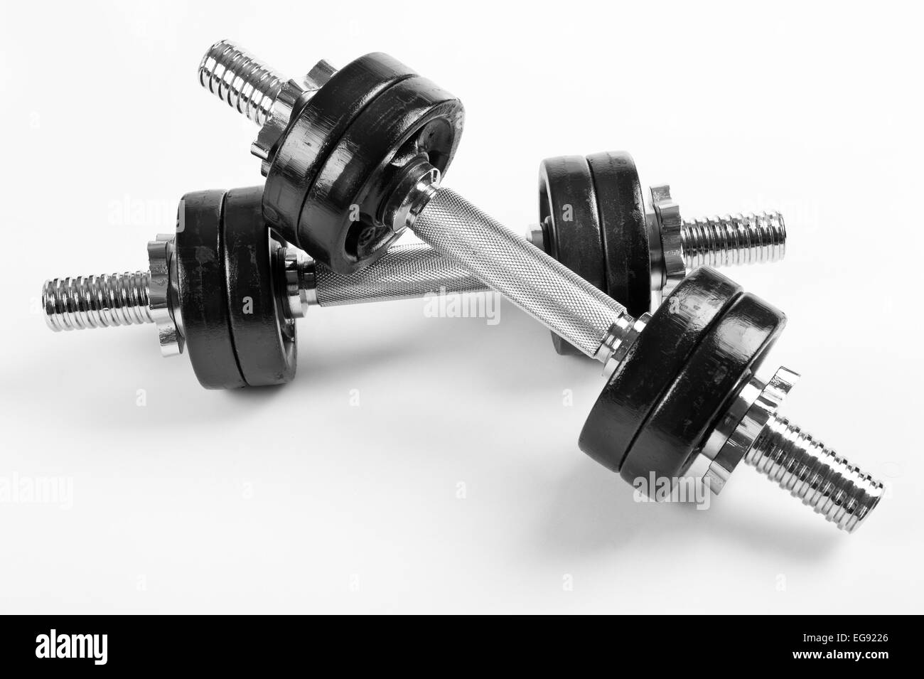 Two heavy hand barbells weights Stock Photo Alamy