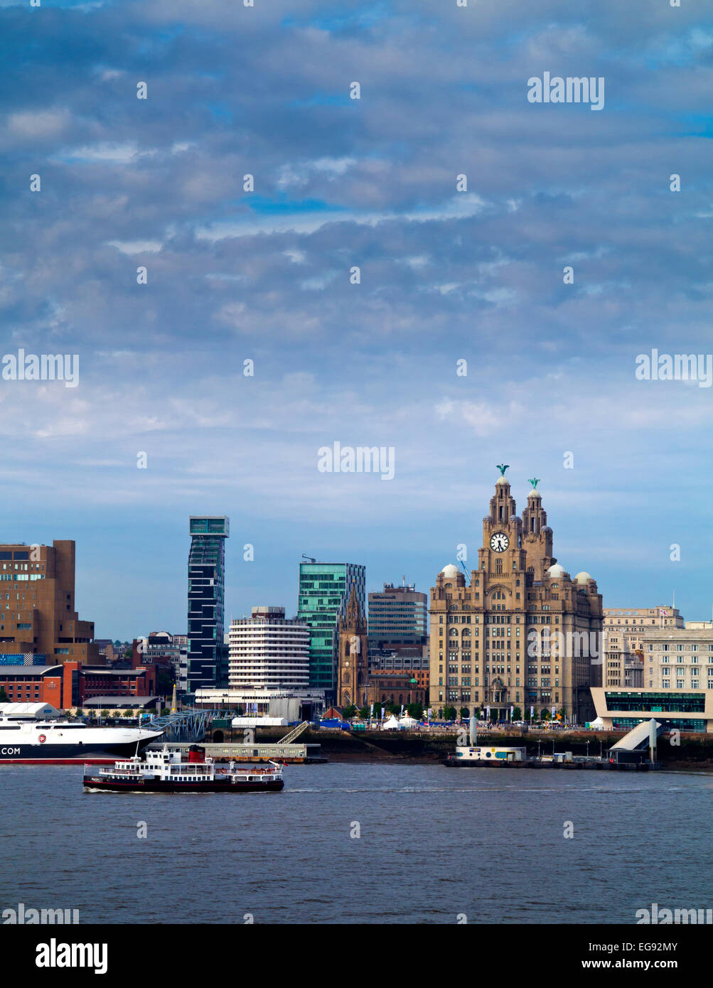 View across the River Mersey towards the City of Liverpool Waterfront with skyline and  Royal Iris Ferry England UK Stock Photo