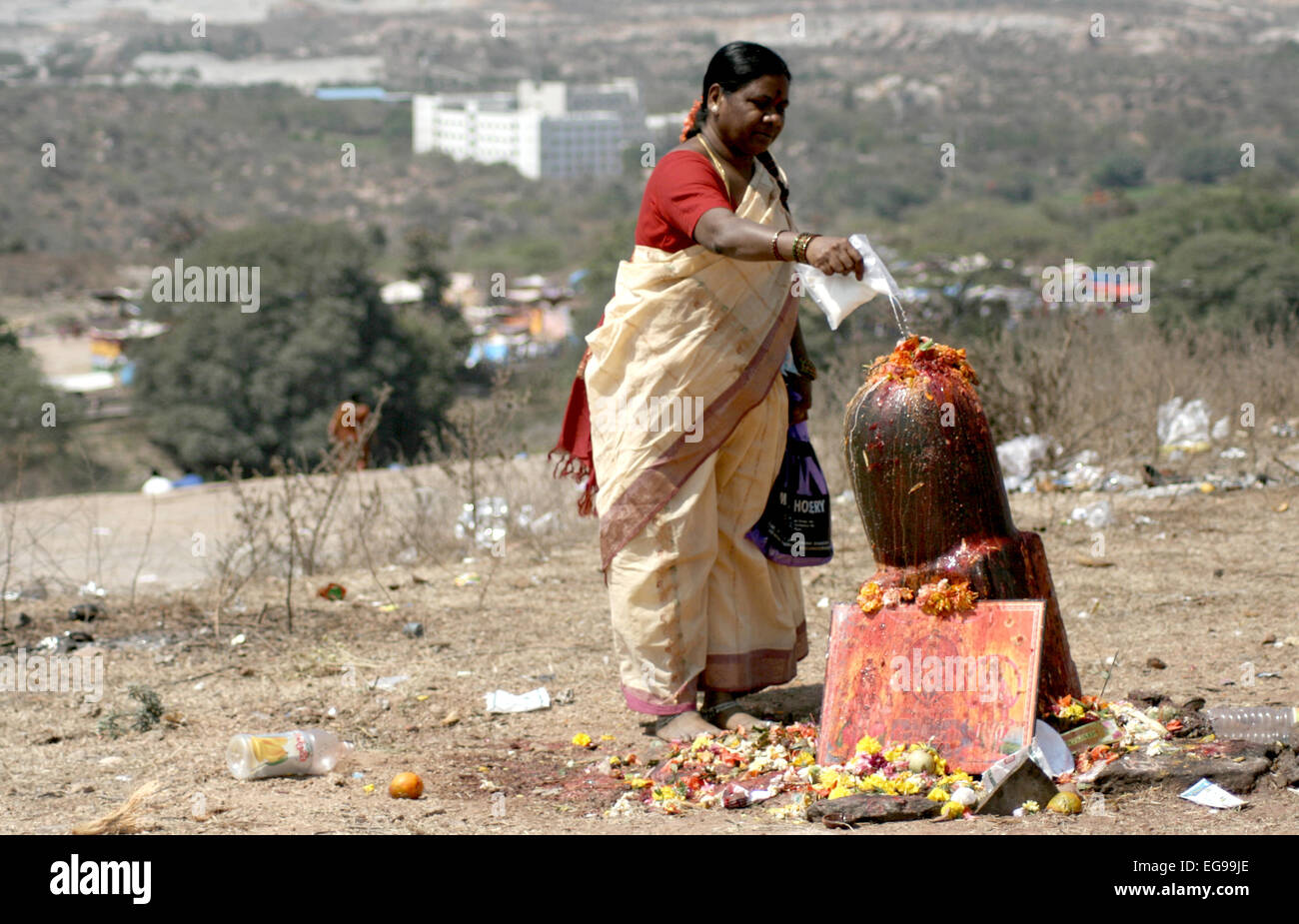 Hindu devotee perform puja to lord siva on maha sivaratri day in keesara gutta,Andhra pradesh,India on February,27,2014. Stock Photo