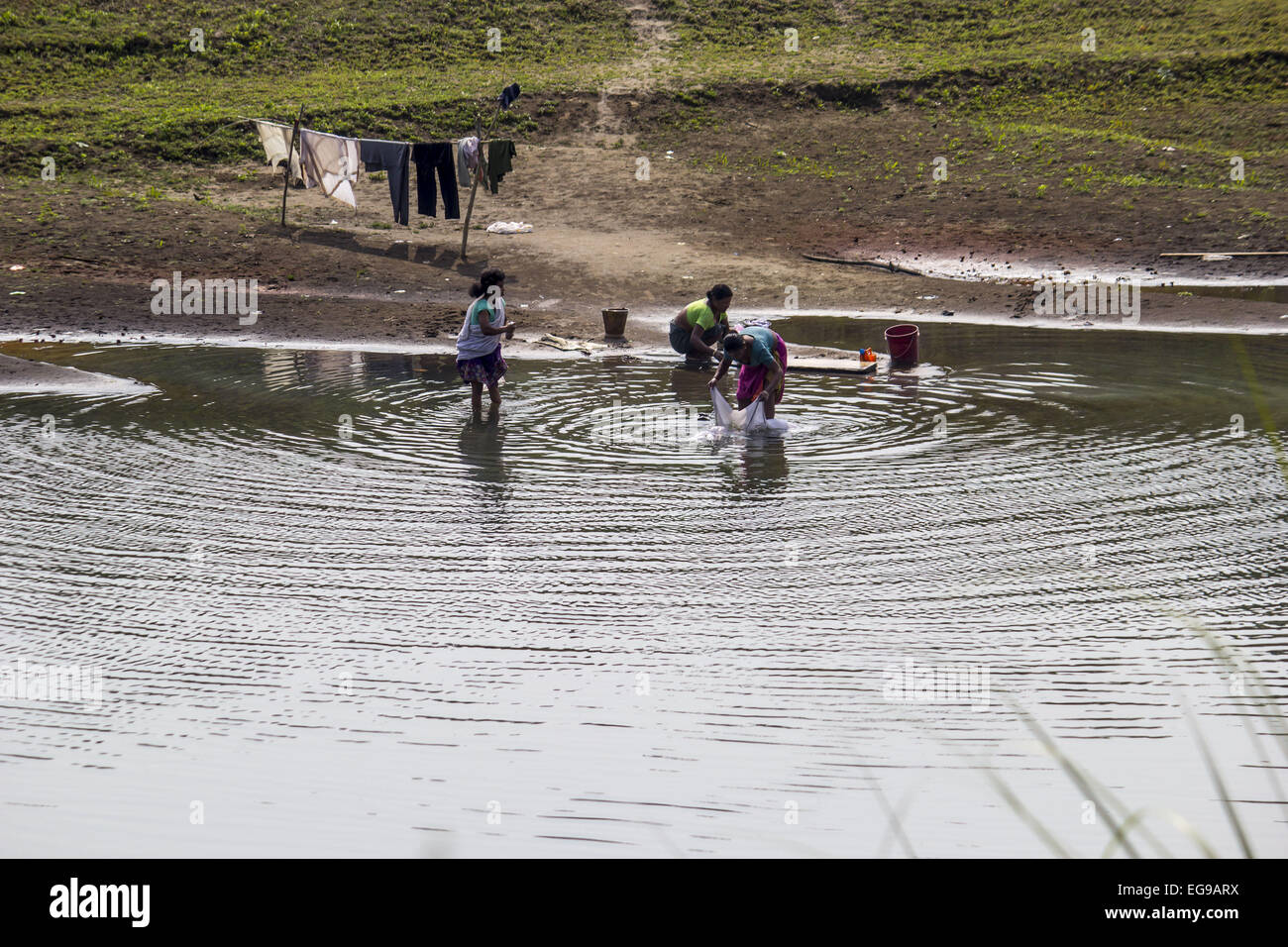 Sivasagar Rivers Sivasagar, Assam, India. 20th Feb, 2015. Indian women washing cloths ...