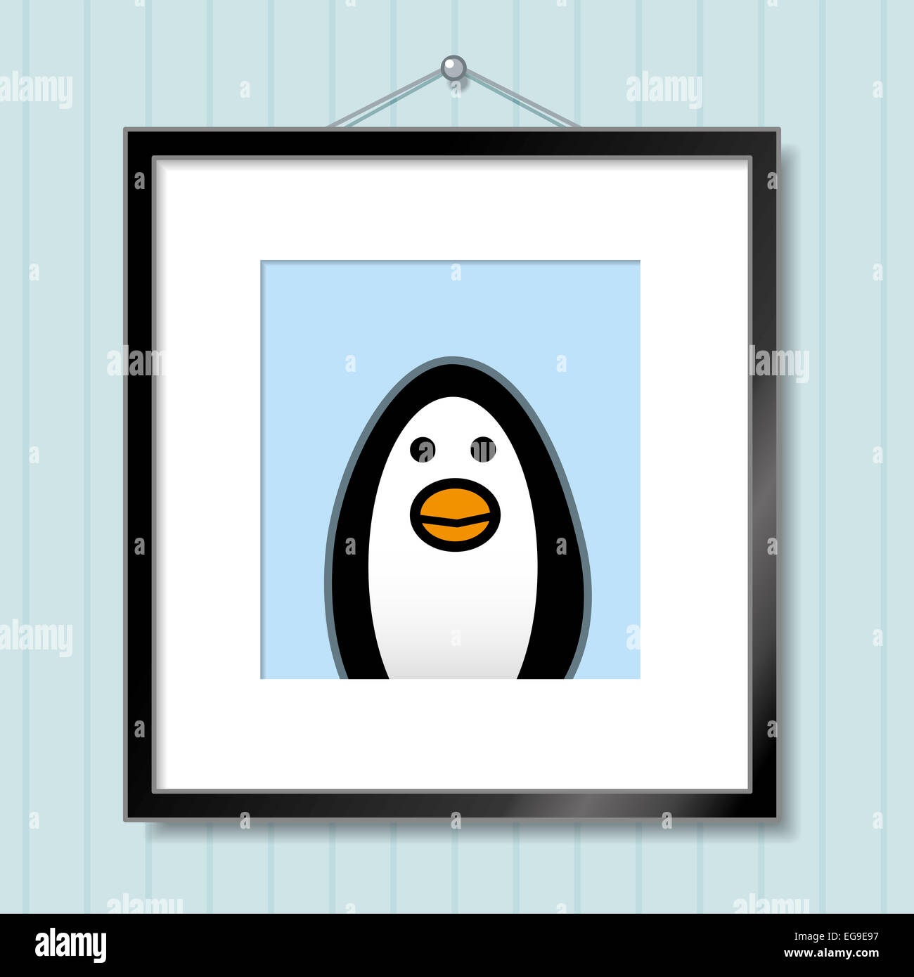 Cute Portrait of Single Penguin in Picture Frame Hanging on Blue Wallpaper Background Stock Photo