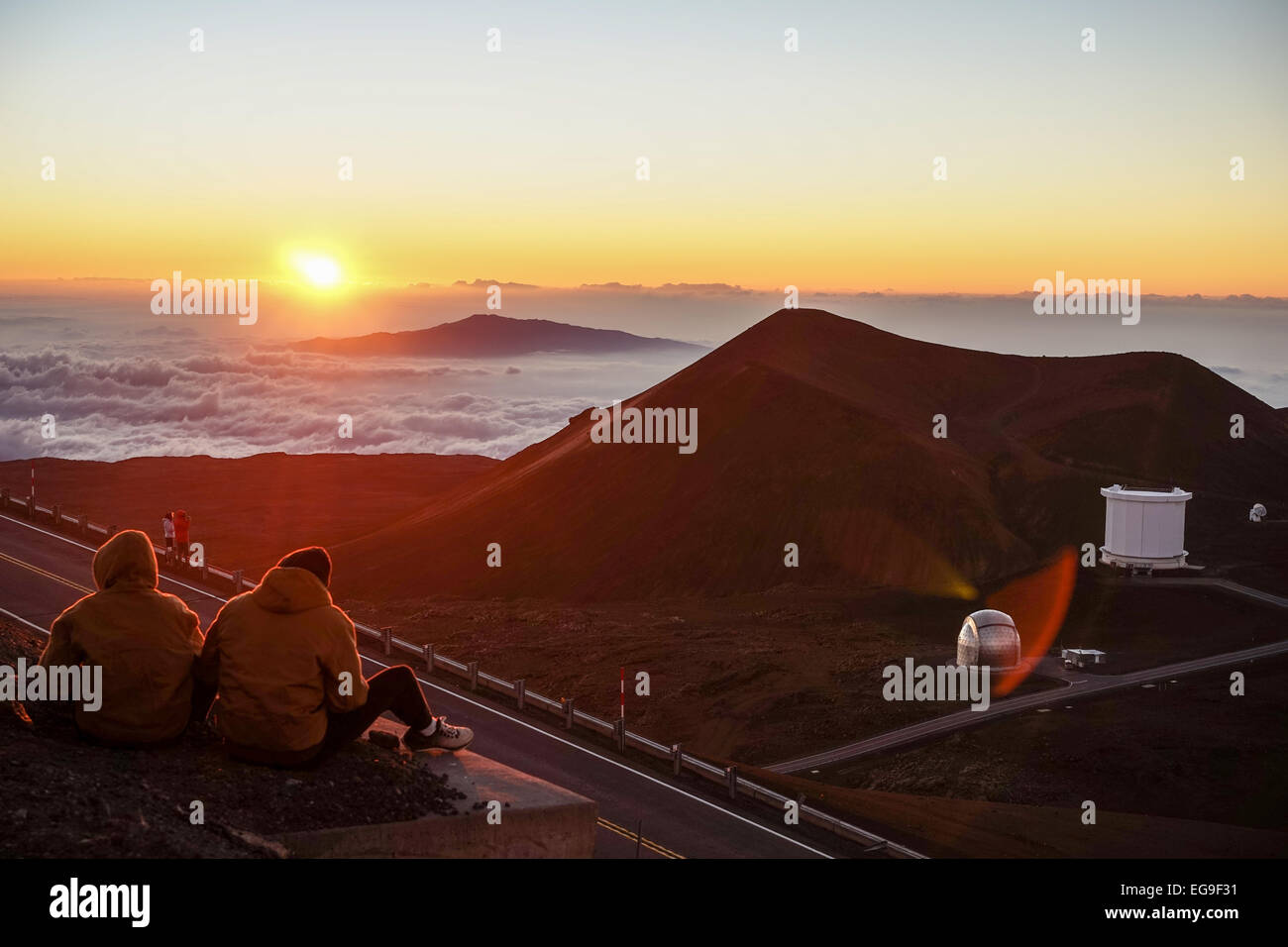 Two women watching the sunset hi-res stock photography and images - Alamy