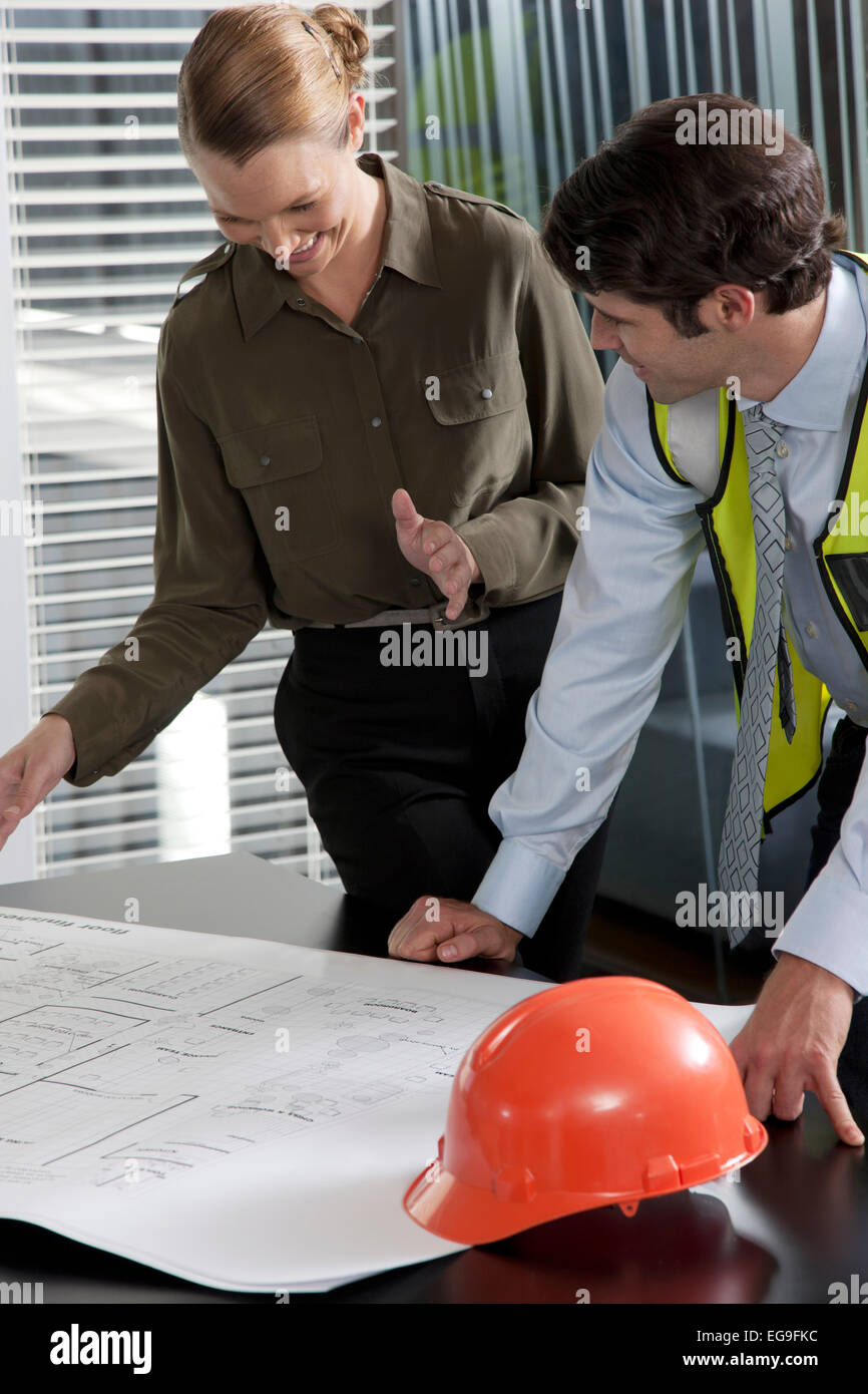 Architect talking about plans with foreman Stock Photo