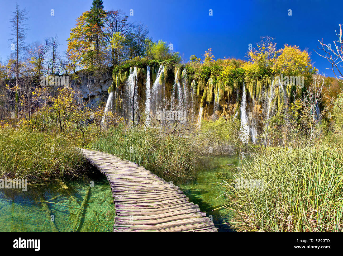 Walkway through paradise in Plitvice lakes national park of Croatia Stock Photo