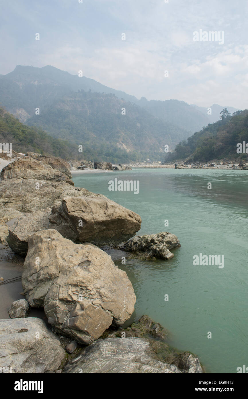 The Ganges or Ganga river in the foothills of the Himalaya, just above Rishikesh in Uttarakhand, North East India. Stock Photo