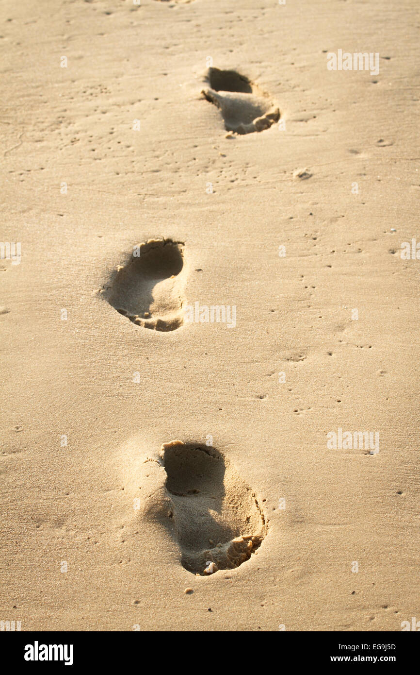 Foot steps on the beach Stock Photo - Alamy